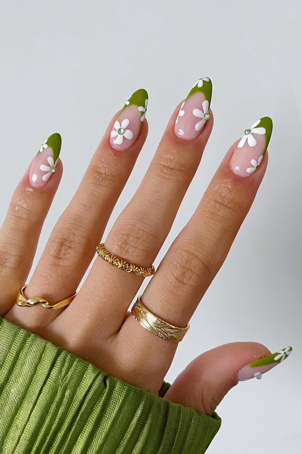 Green French nails with chunky daisy art