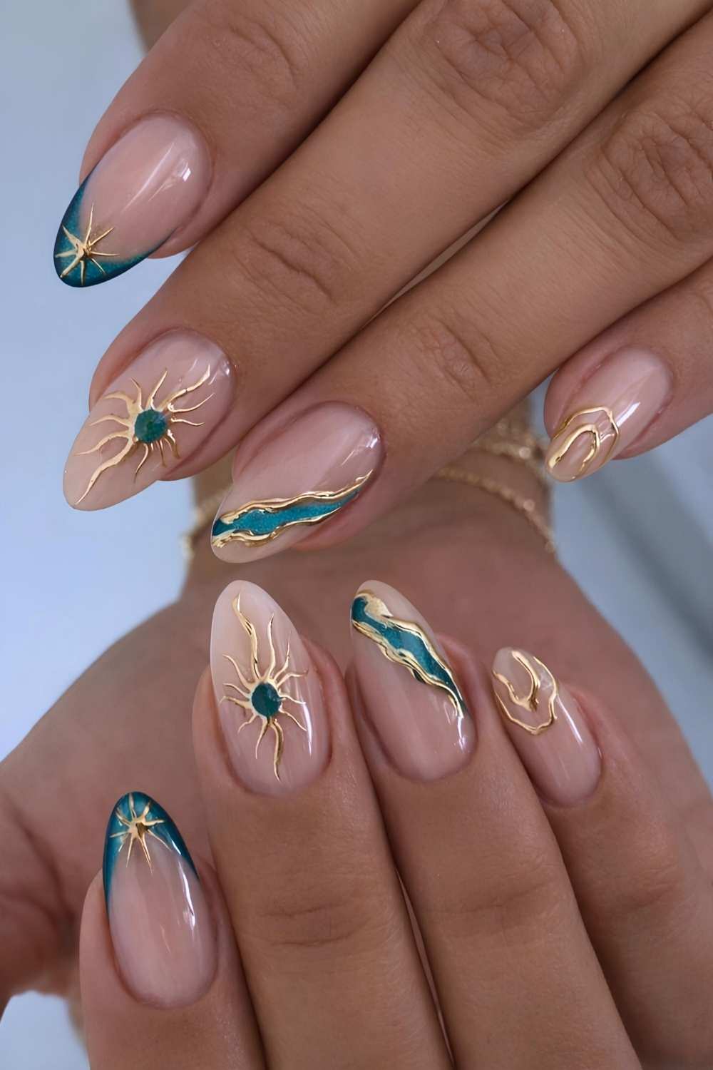 Green velvet mani with gold celestial art