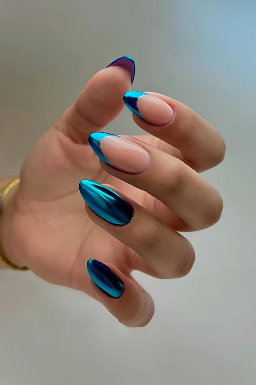 Light blue chrome mix of French tip and solid nails