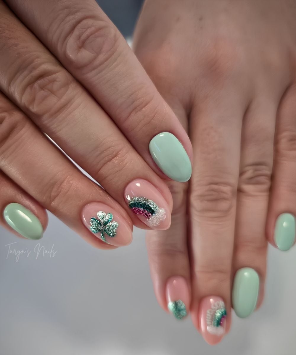 Light green nails with st patricks day motifs