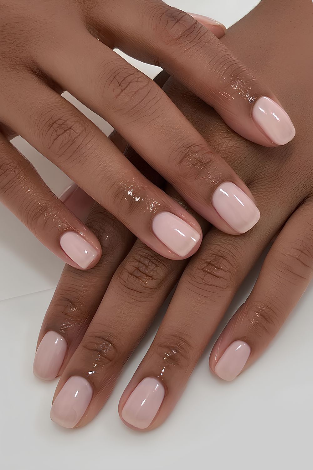 Light pink clean-girl nails