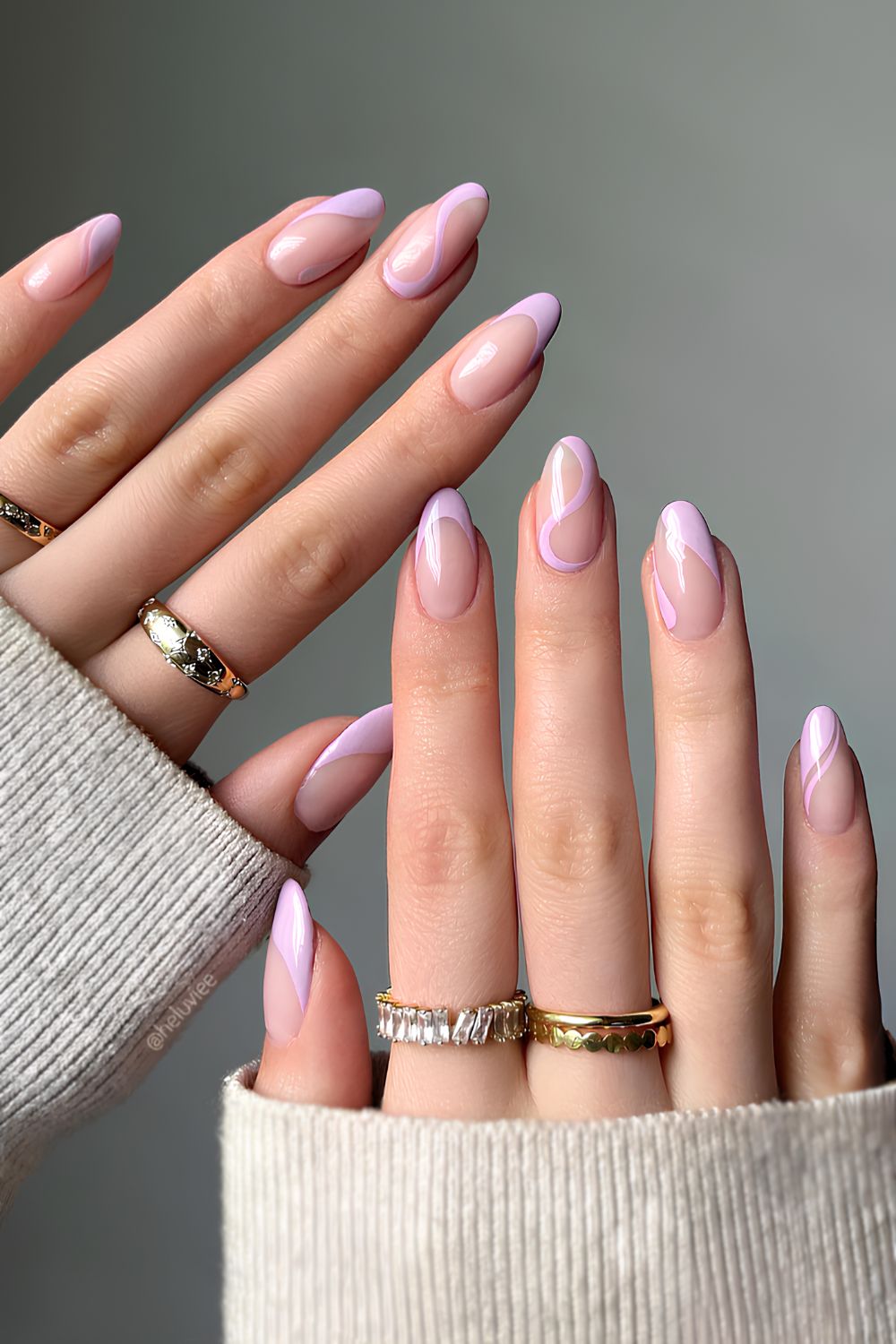 Lilac French nails with swirl accents