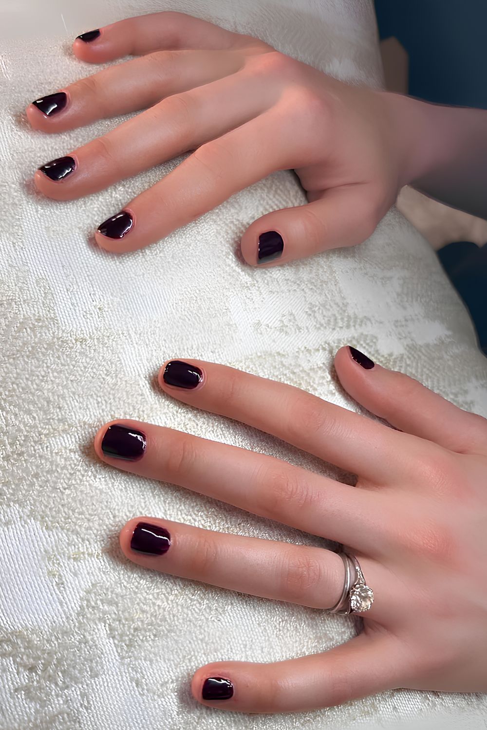 Margaret Quallys short plum nails