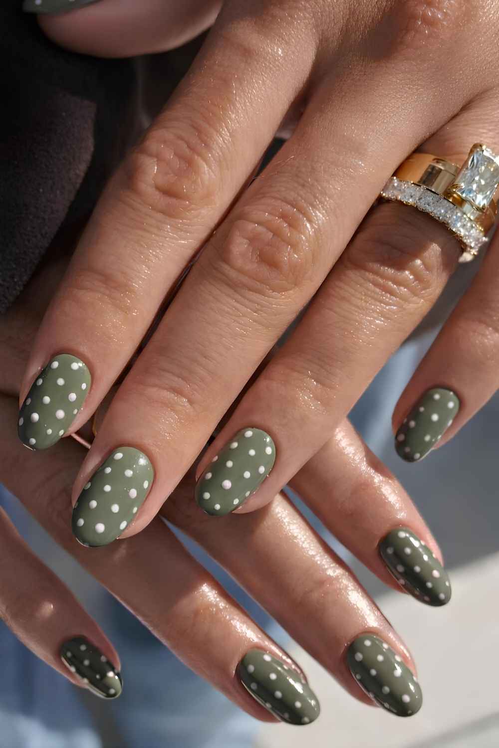 Muted green polka dot manicure