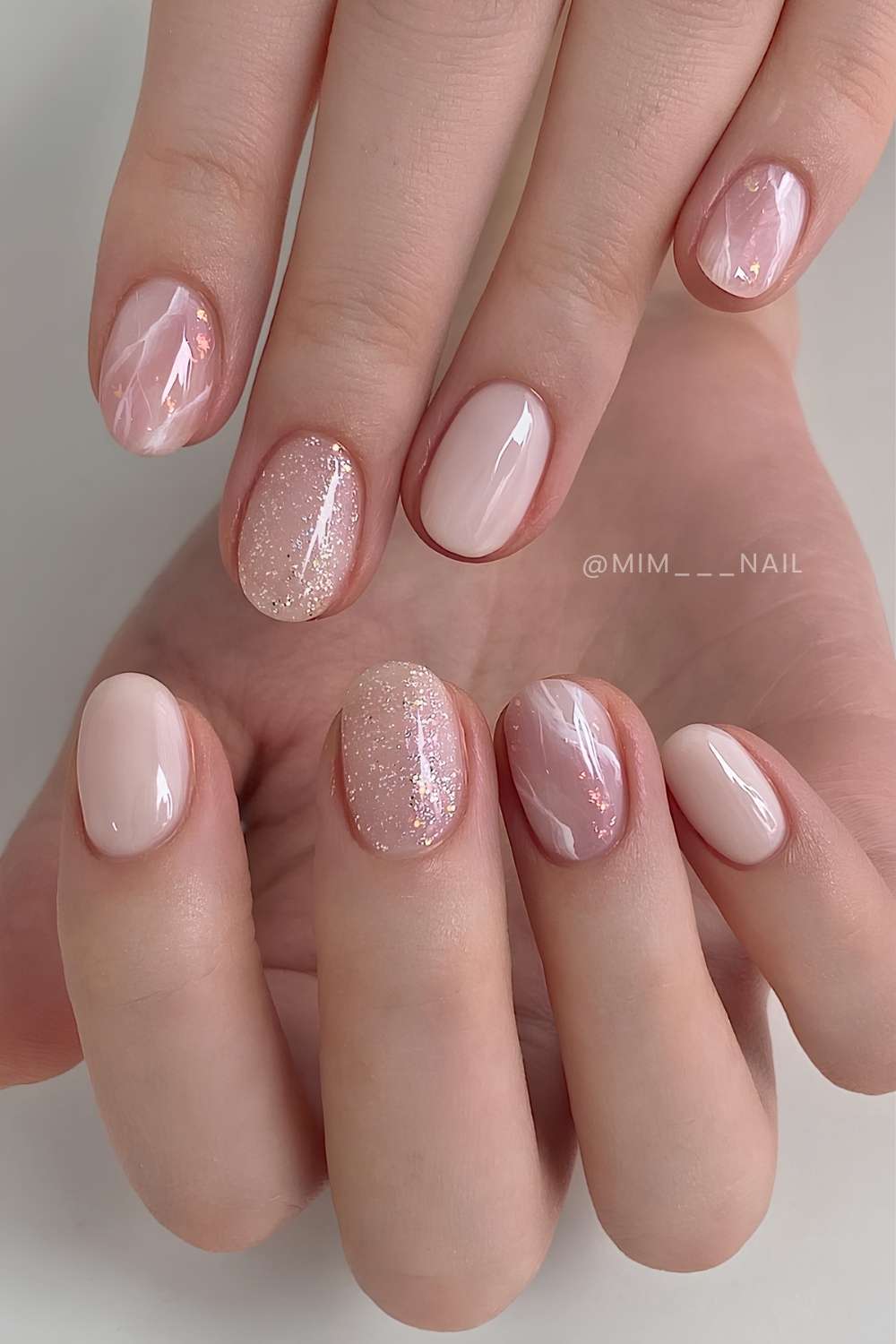 Neutral mani with glitter and marble accents