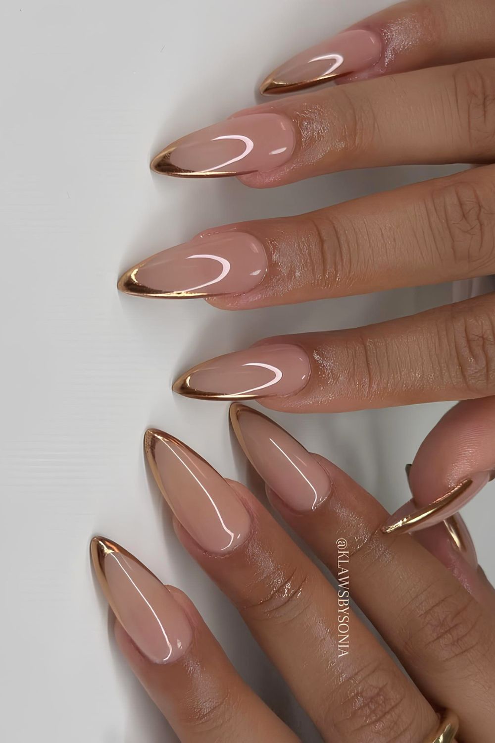 Neutral nails with bronze chrome French tip nails