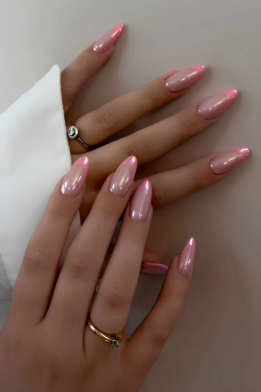 Pink French nails with pearl chrome finish