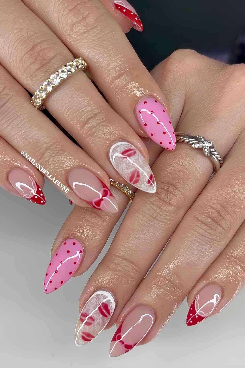 Pink and red nails with hearts and kissy lips