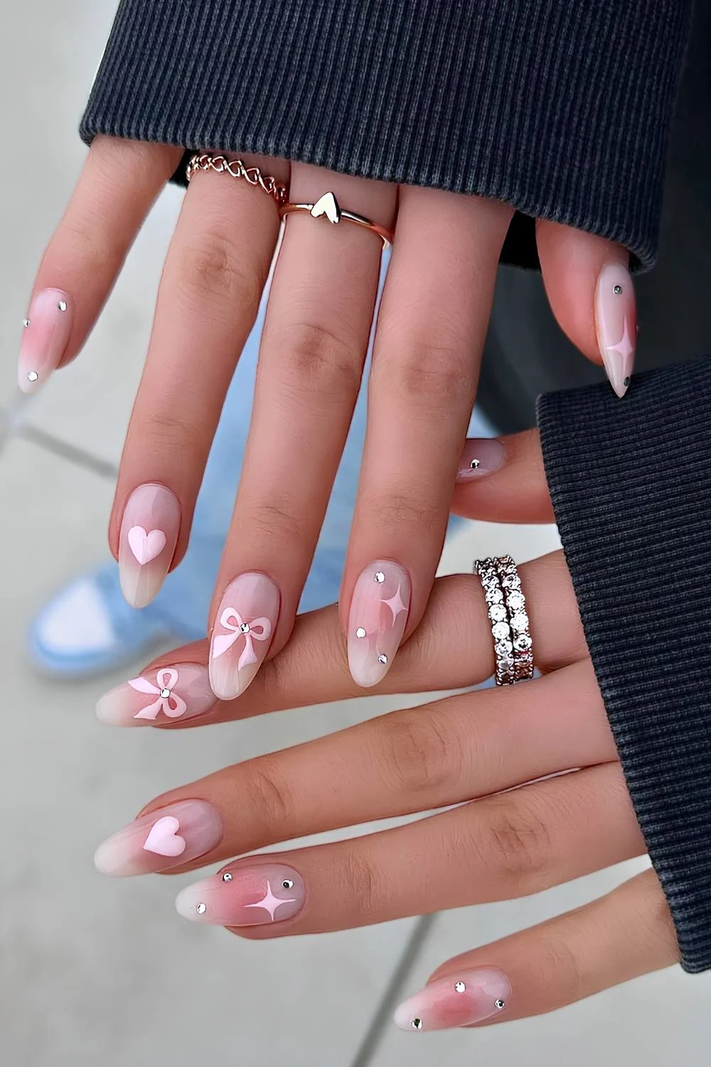 Pink aura mani with bows and rhinestones