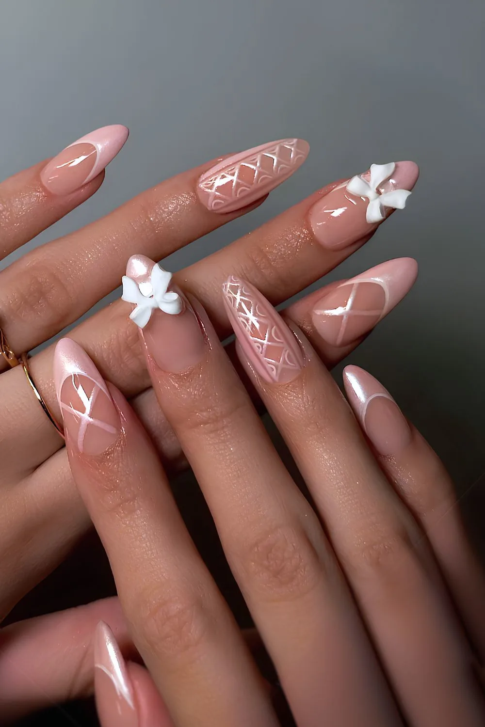 Pink ballet-core nails with bows