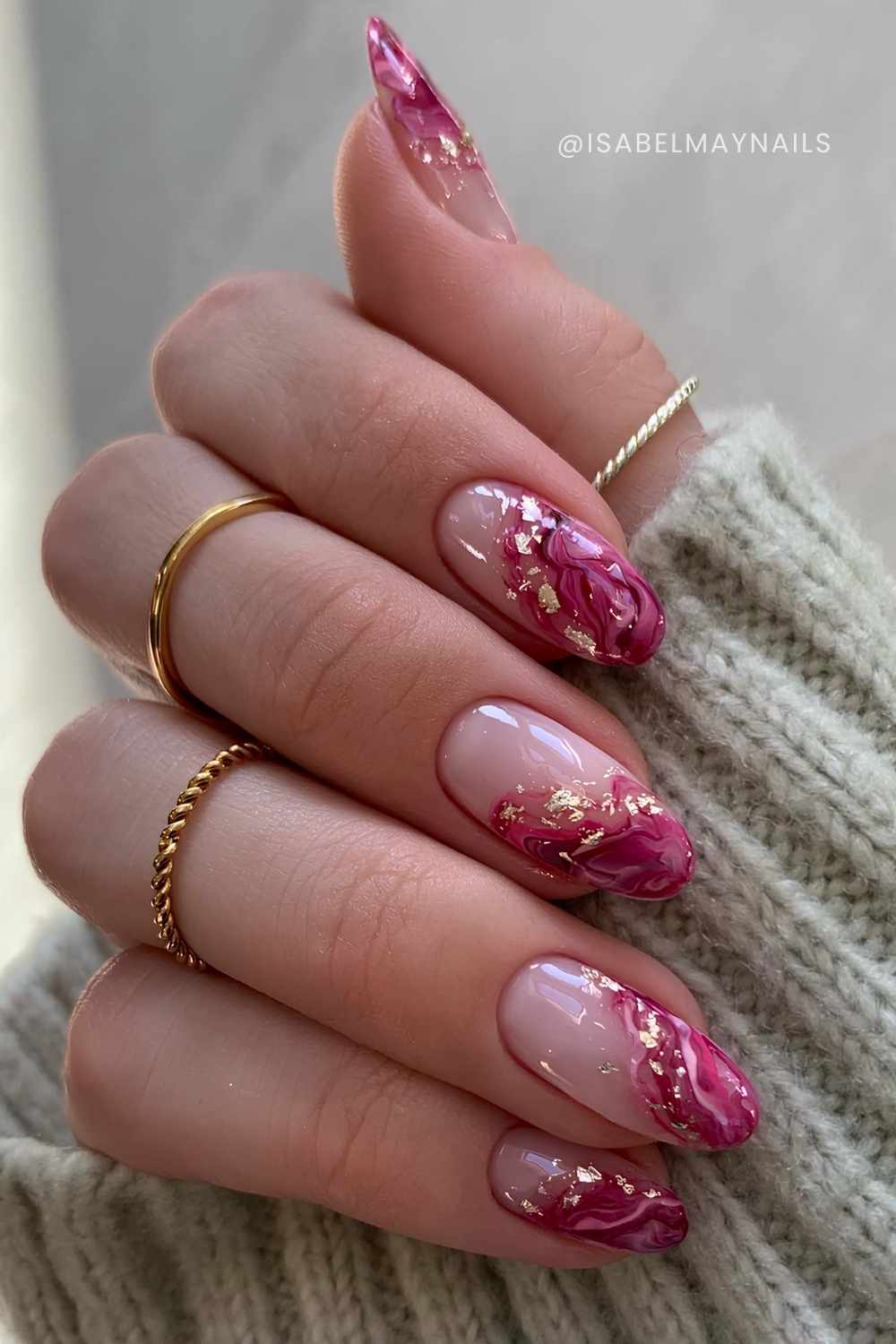 Pink marble nails with gold foil accents