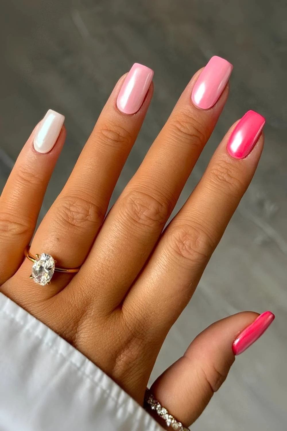 Pink skittle mani with chrome finish