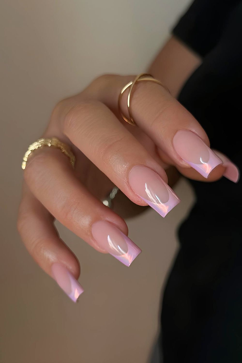 Pink unicorn chrome French tip nails.