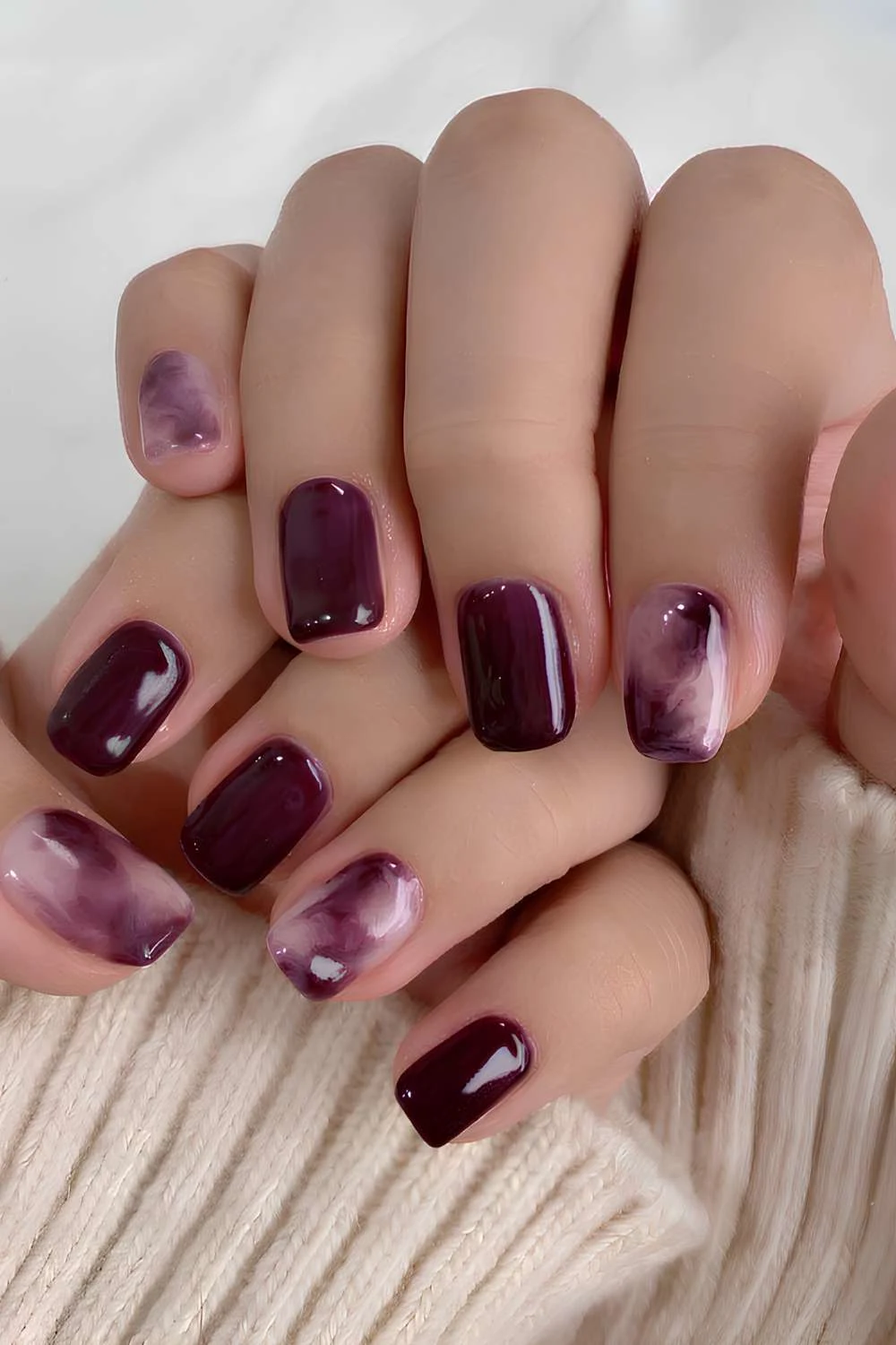 Maroon Marbled Nails That Elevate Any Look