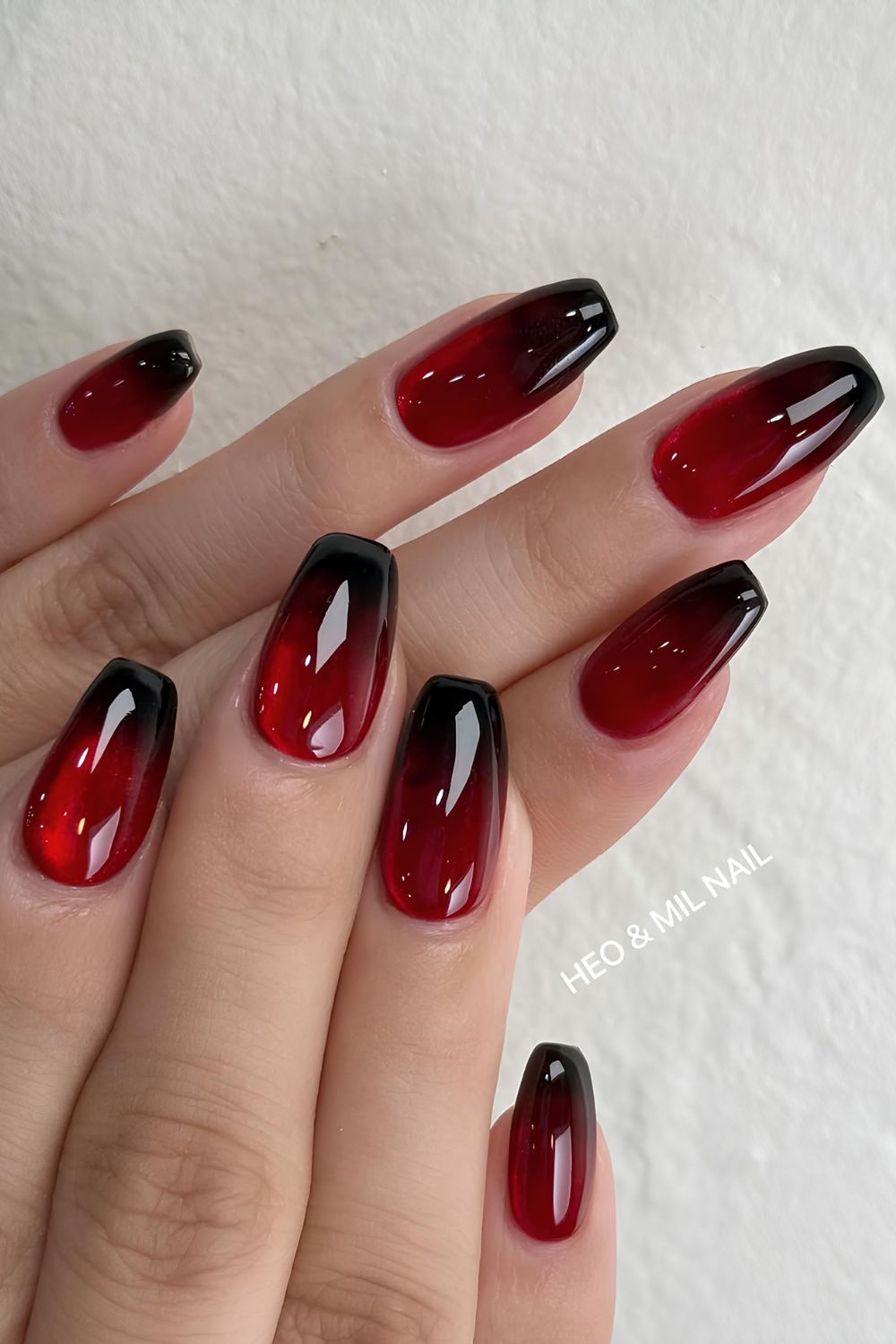 Red and black jelly ombre nails