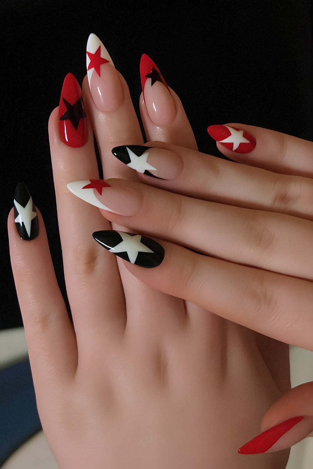 Red and black nails with star art