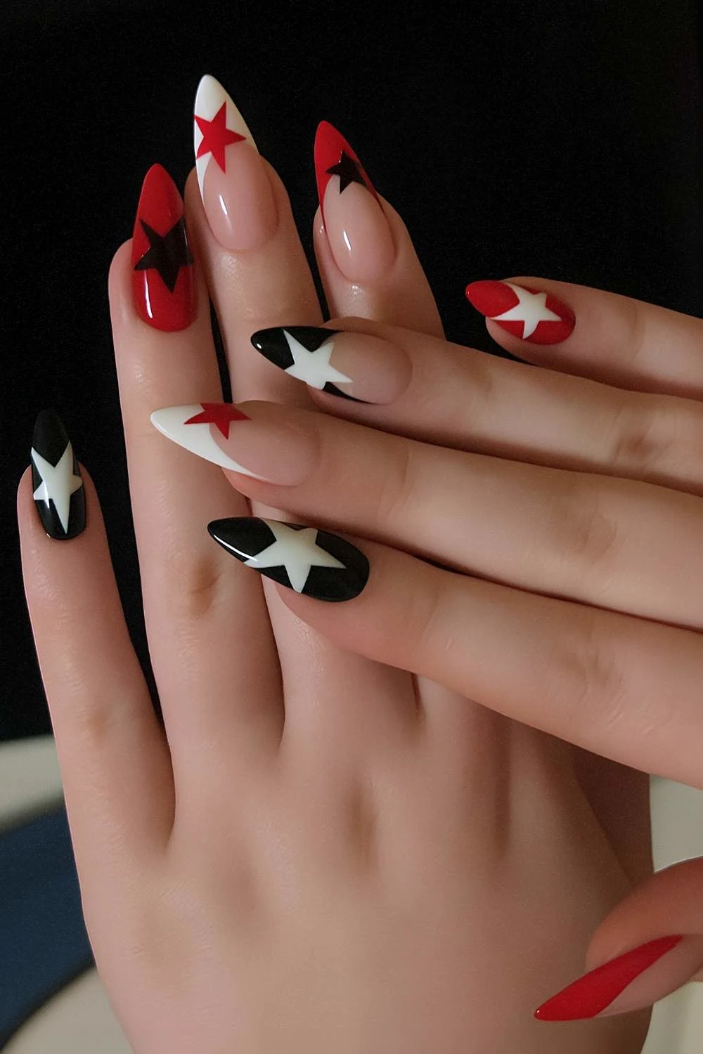Red and black nails with star art