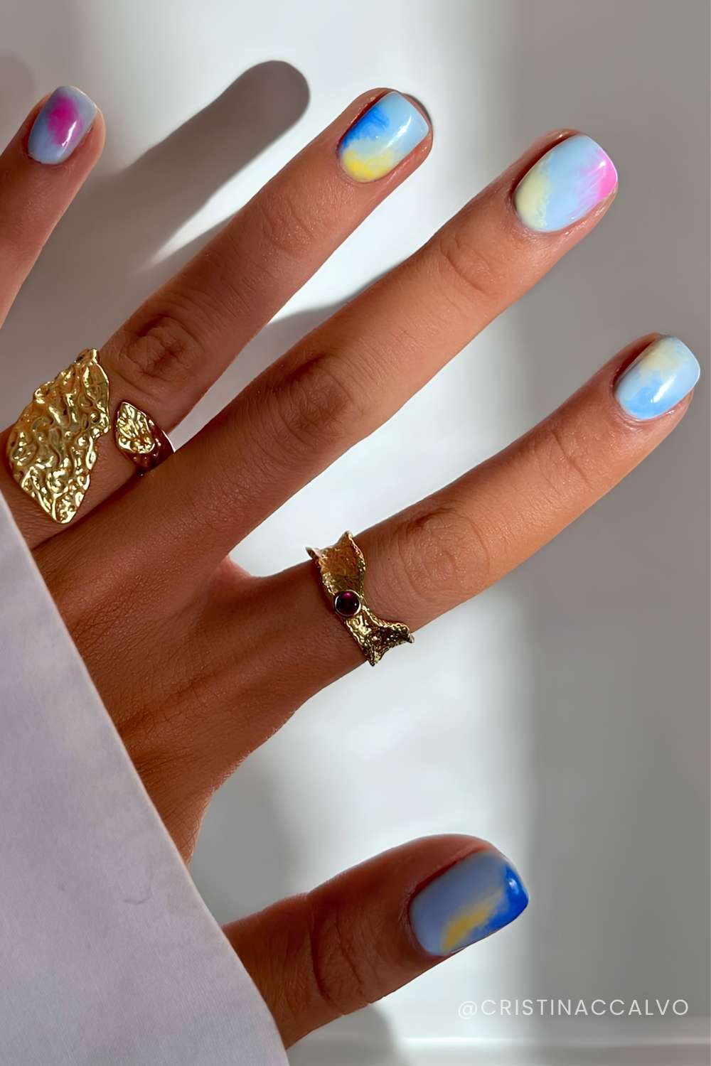 Short and colorful marble nails