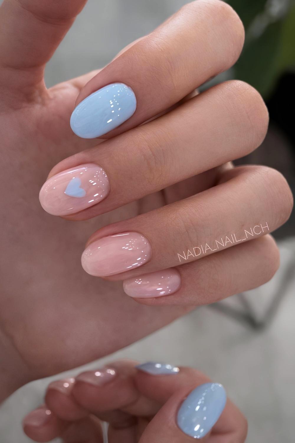 Short baby blue mani with accent hearts