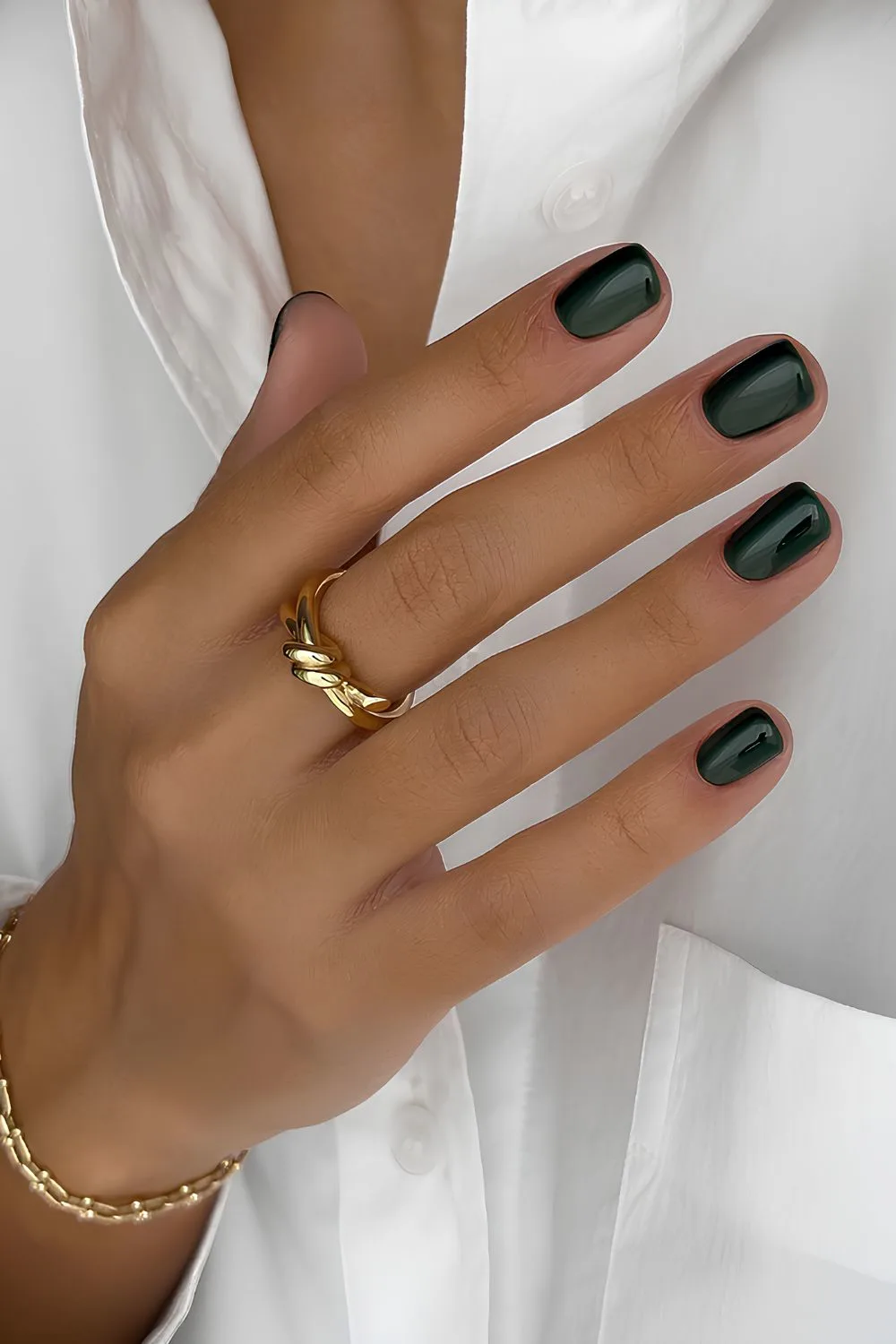 Short dark green nails