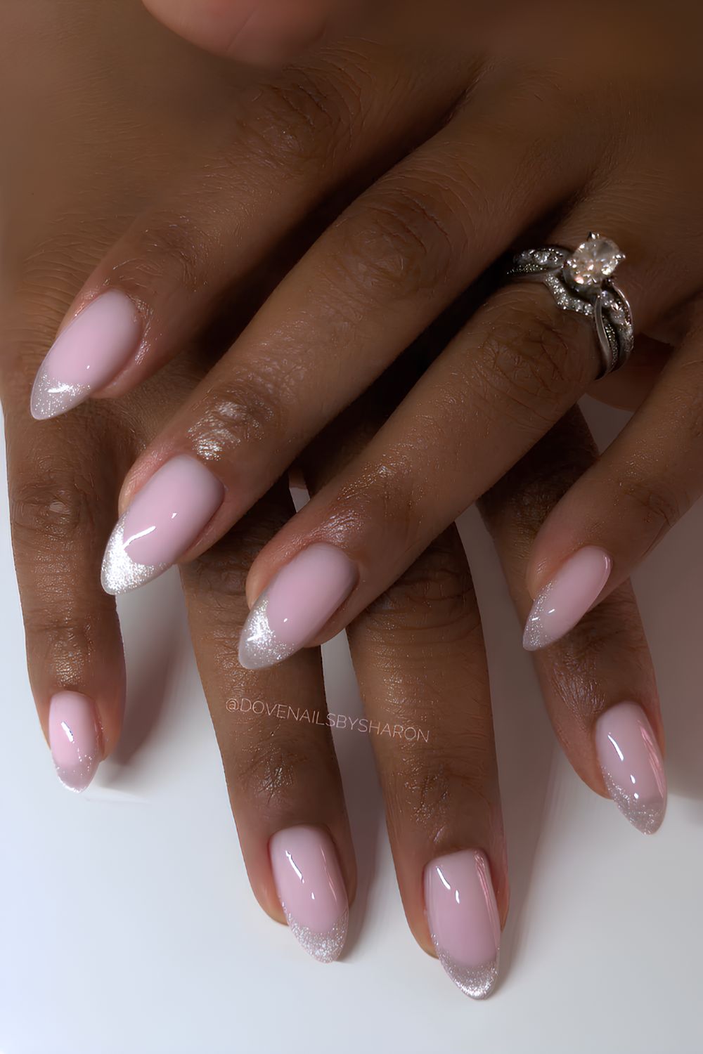 Silver cat eye French tip nails