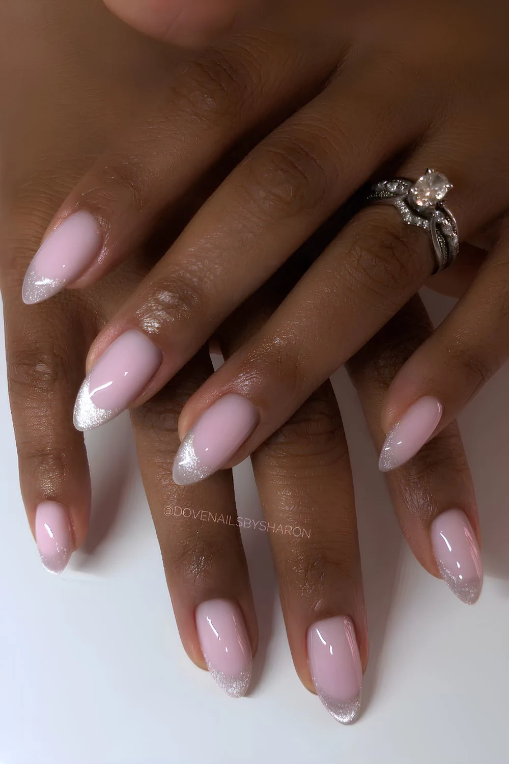 Silver cat eye French tip nails