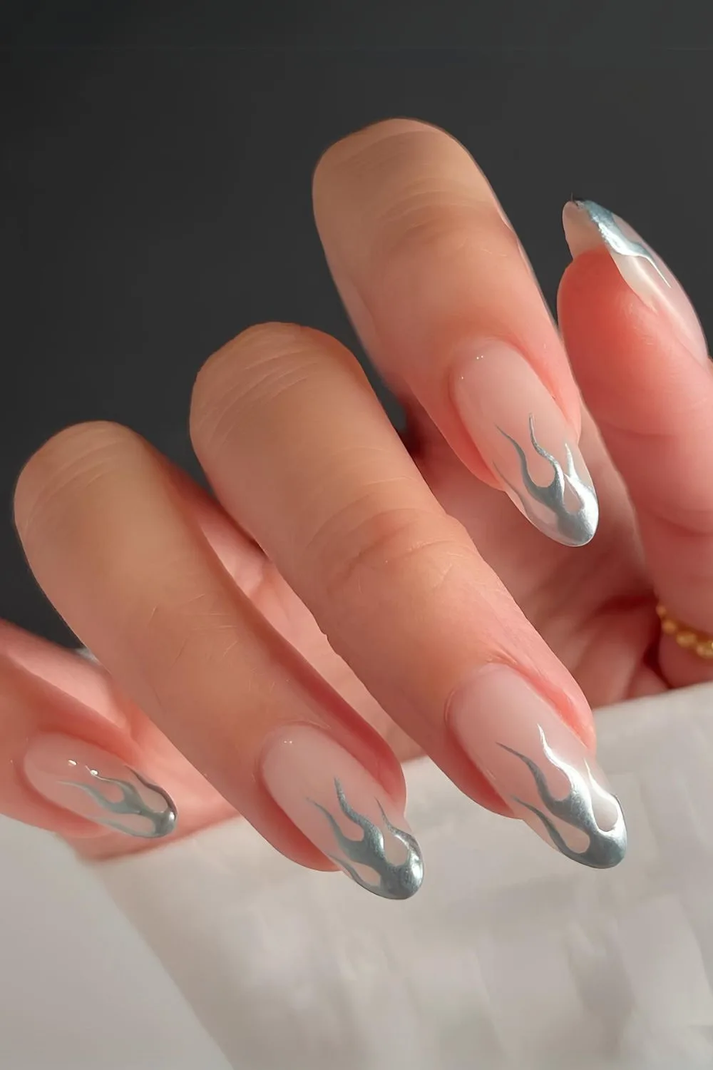 Silver chrome flamed French tip nails