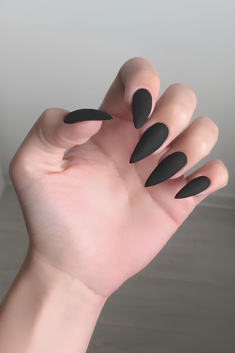 Solid matte black manicure