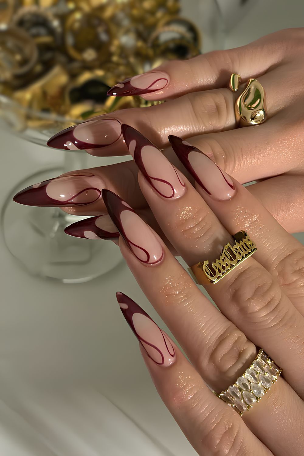 Swirly cherry mocha French tip nails