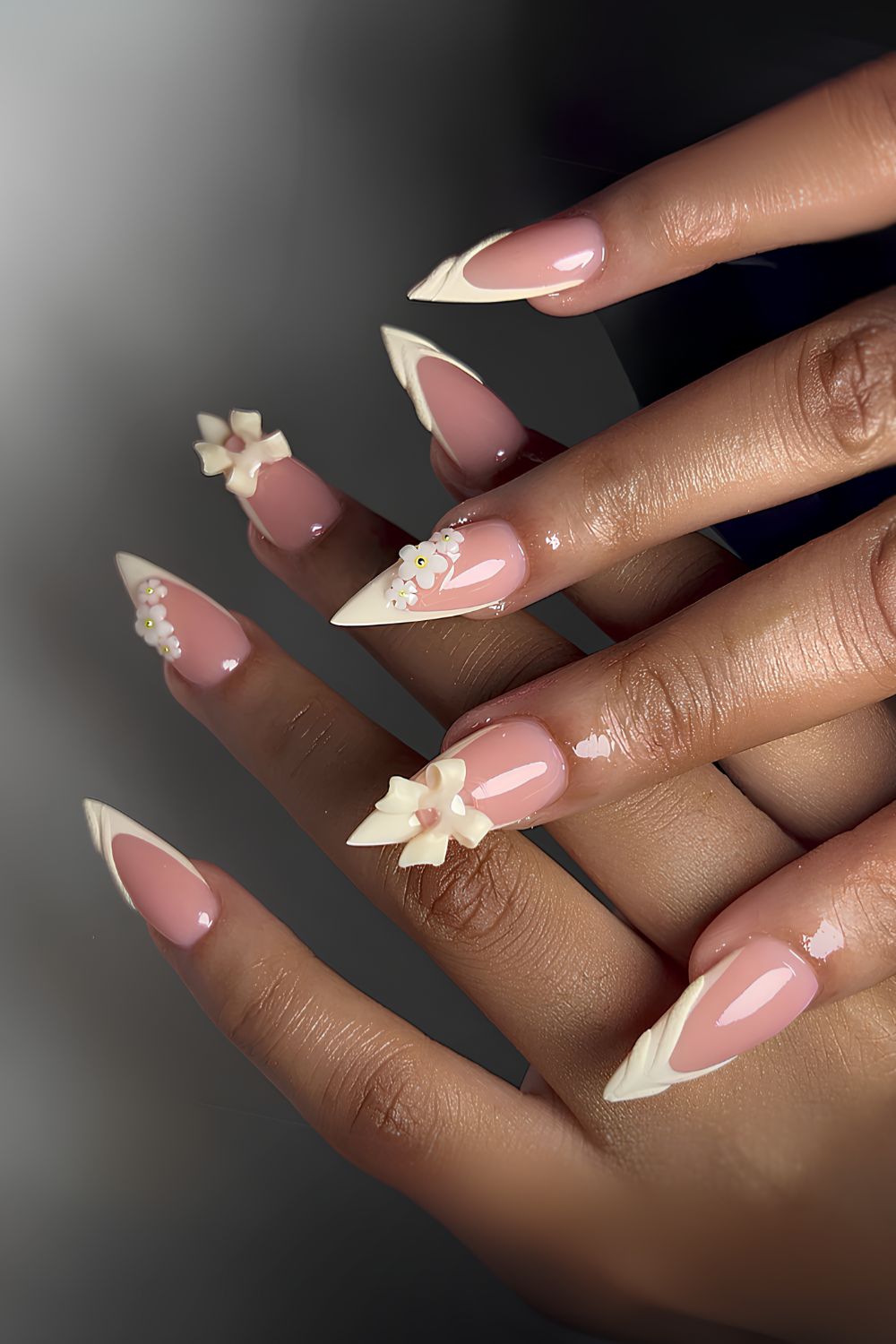 Vanilla French nails with 3D bows and flowers