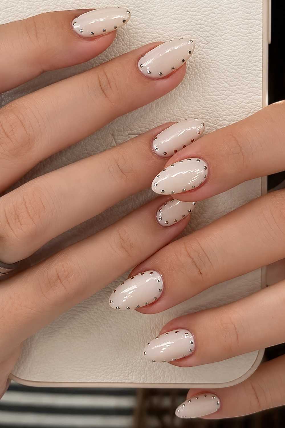 Vanilla mani with silver dot halo accent