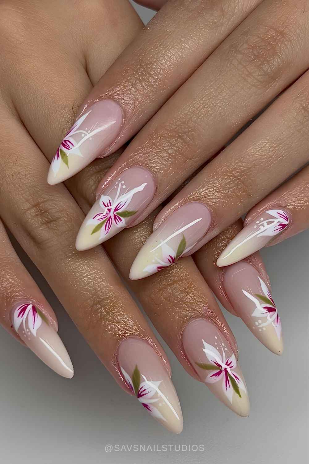 Vanilla ombre nails with floral accents