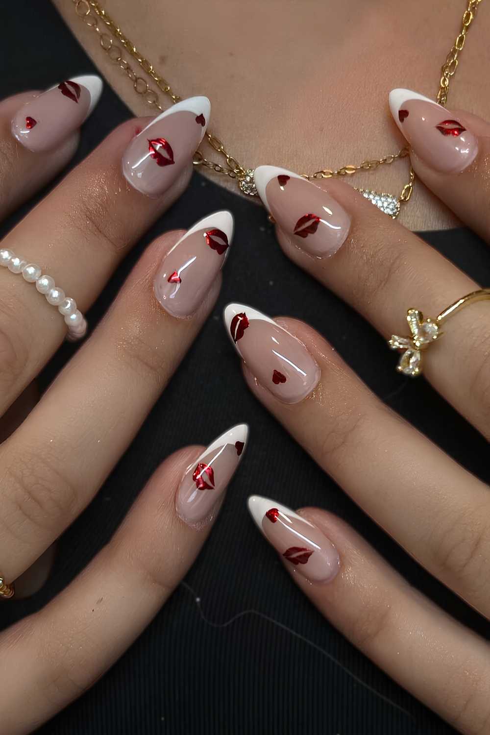 White French mani with metallic kissy art