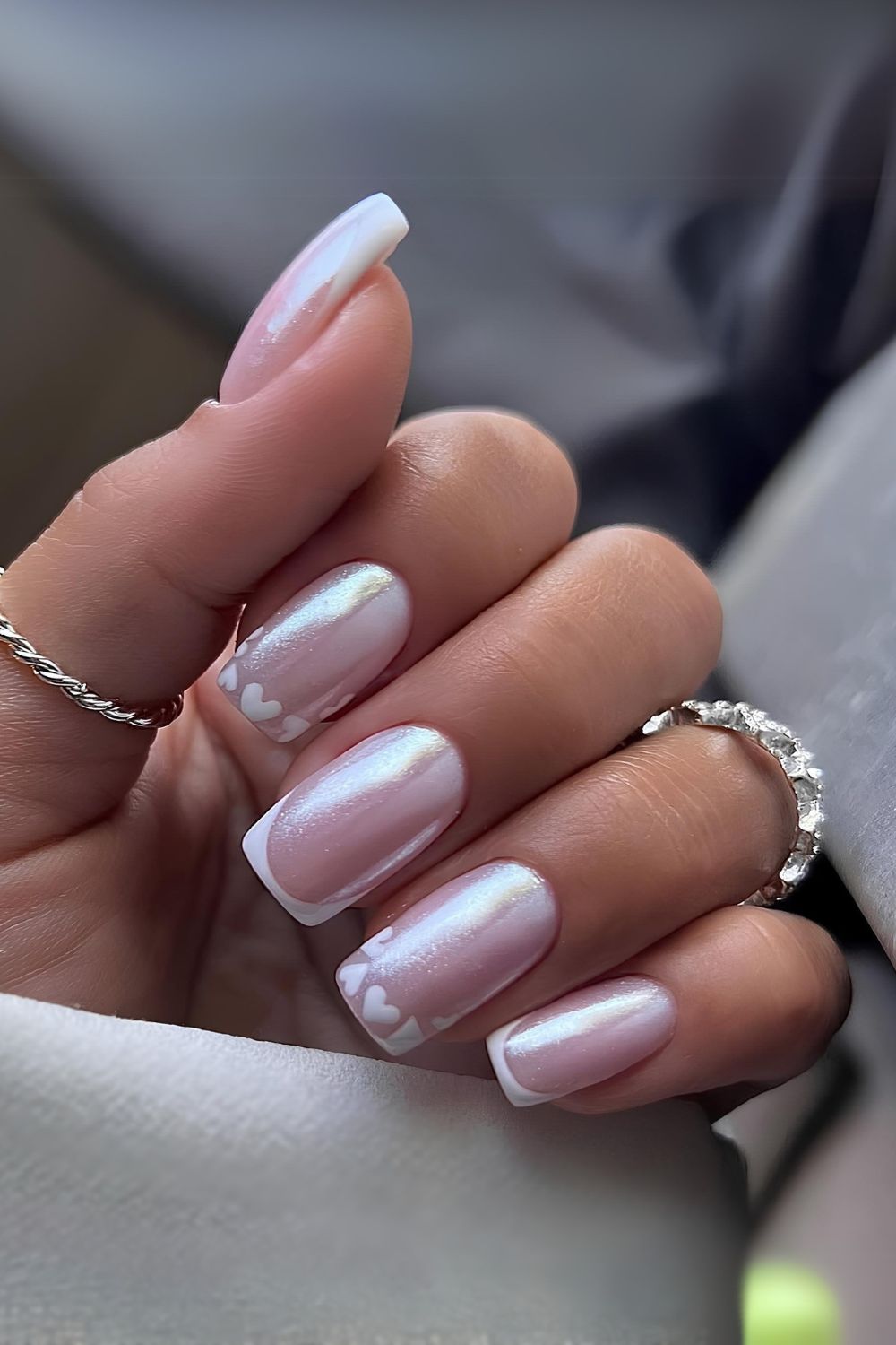 White chrome French nails with hearts