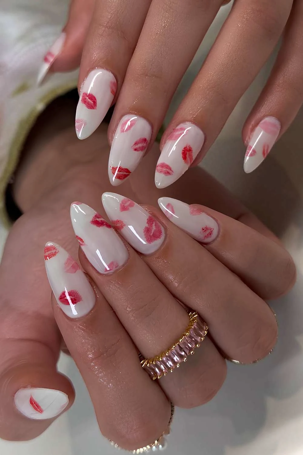 White manicure with red kiss art