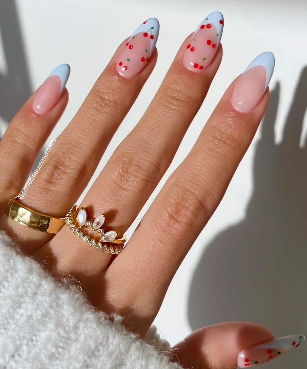Baby blue French nails with cherry art