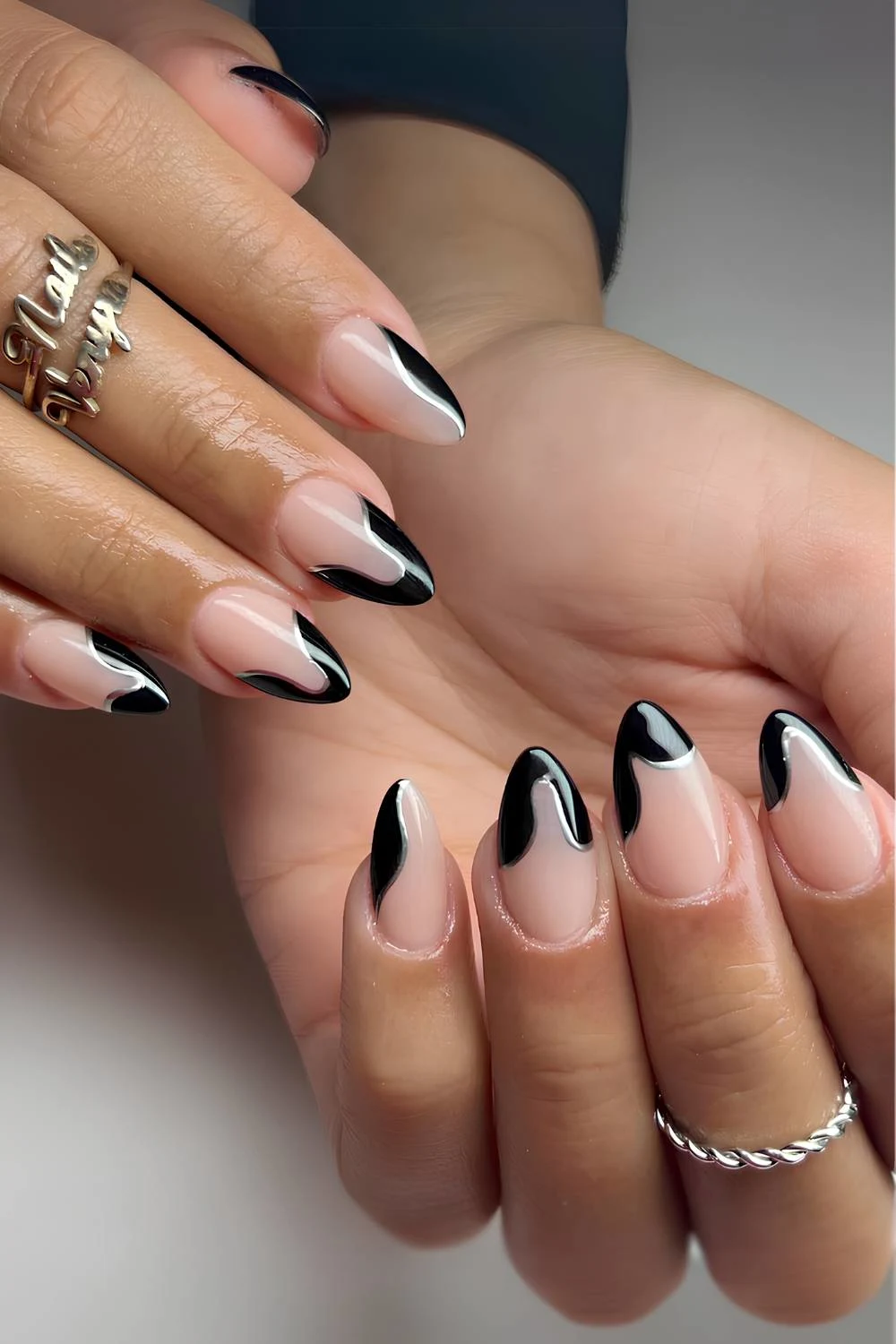 Black and silver drip effect French mani