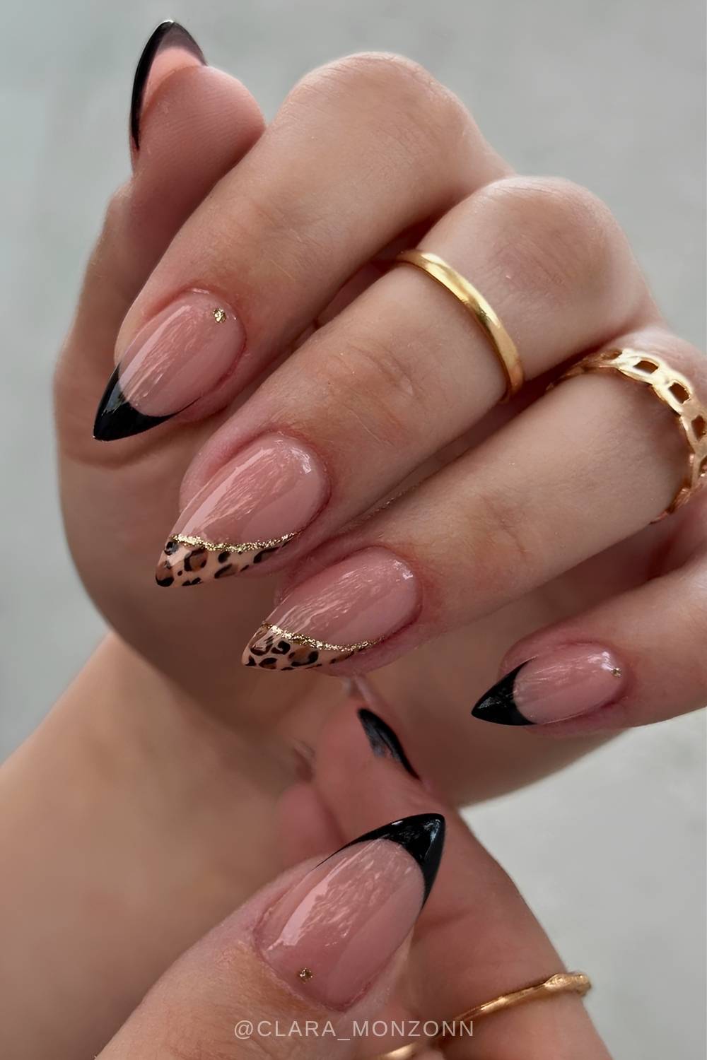 Black stiletto french nails with leopard print