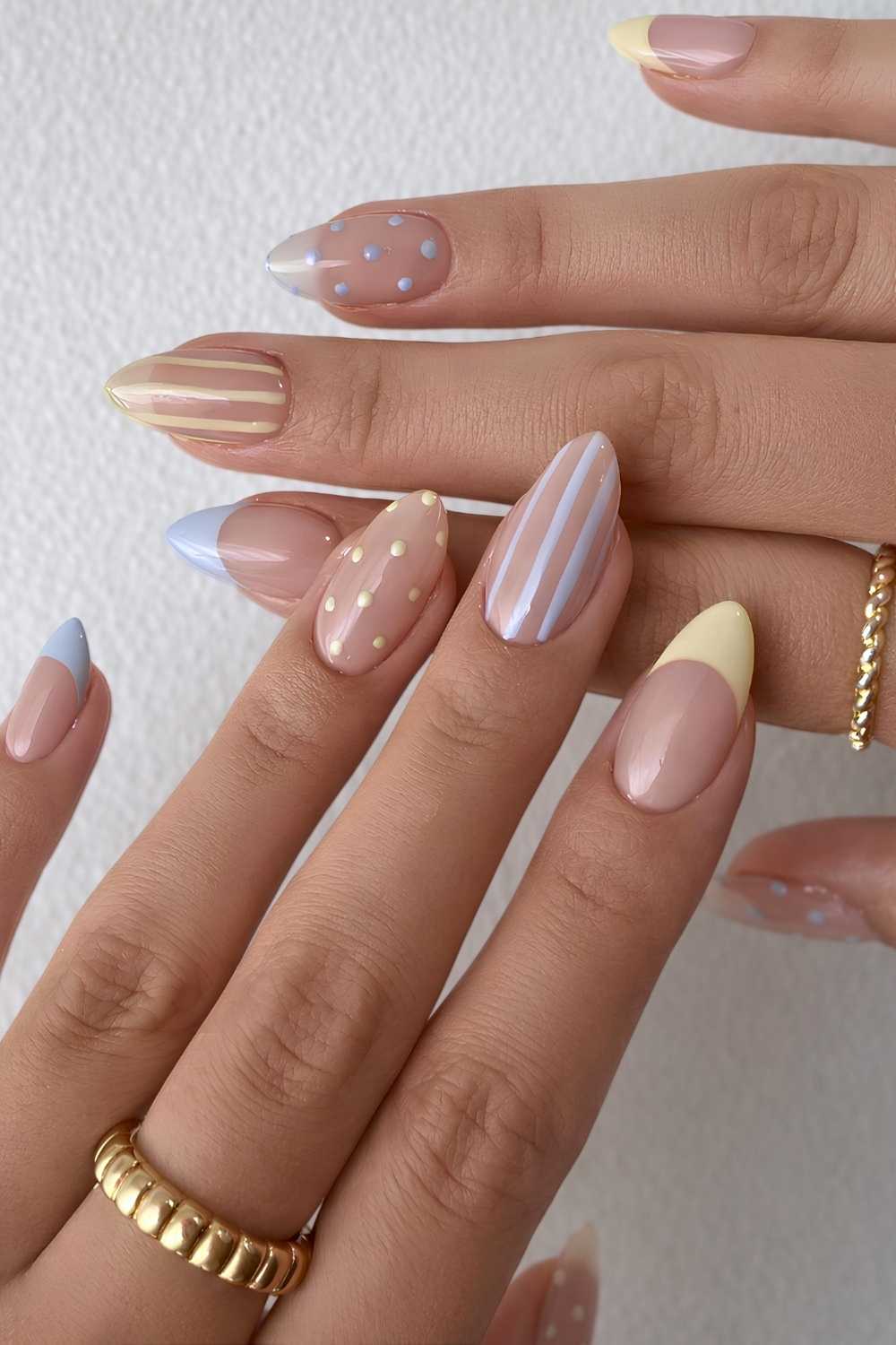 Blue and yellow mani with stripes and dots
