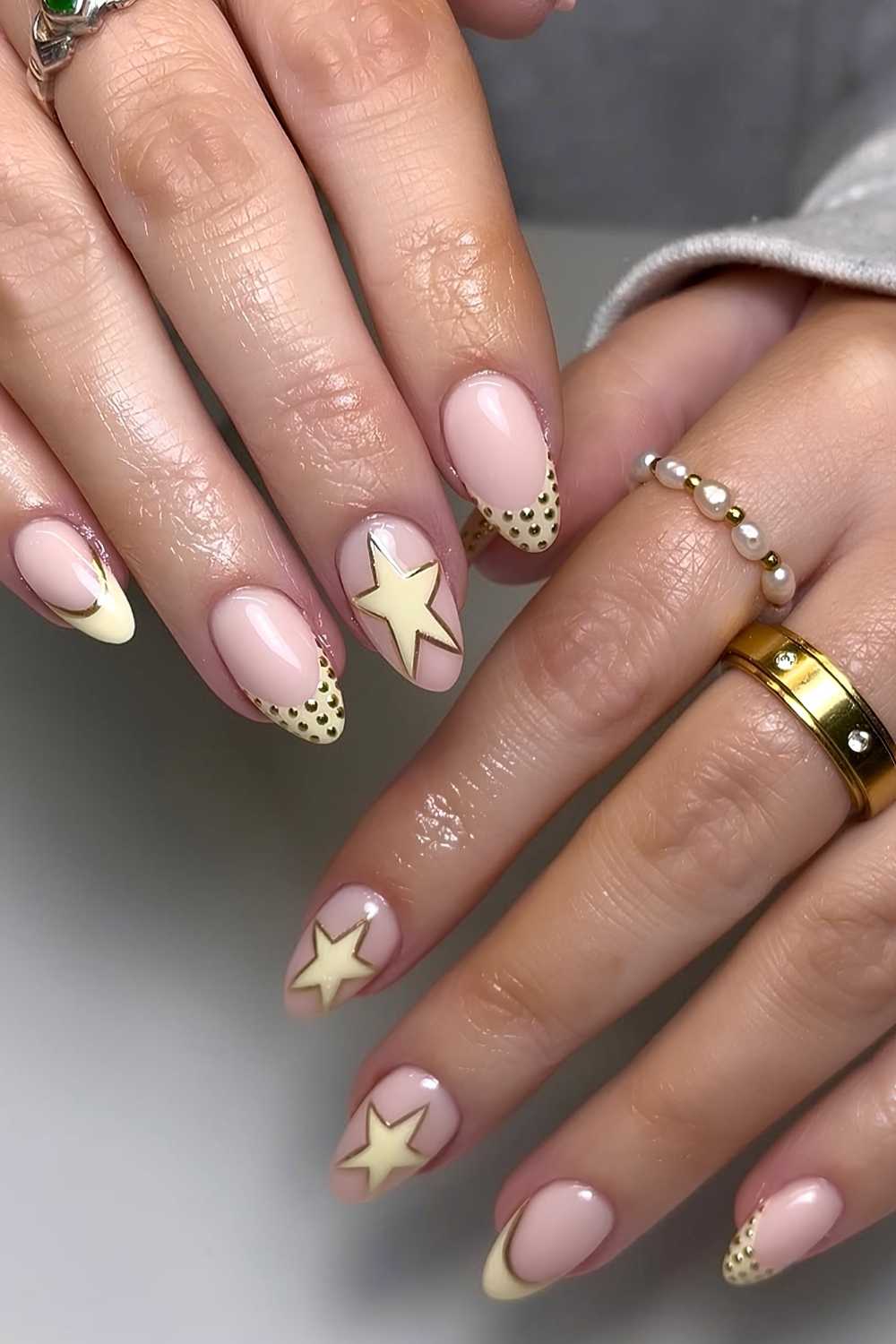 Butter yellow nails with star art