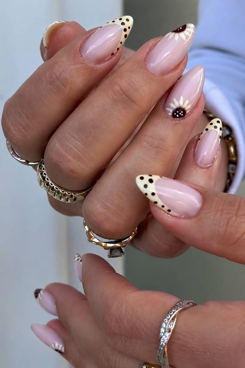 Butter yellow polka French nails with sunflowers