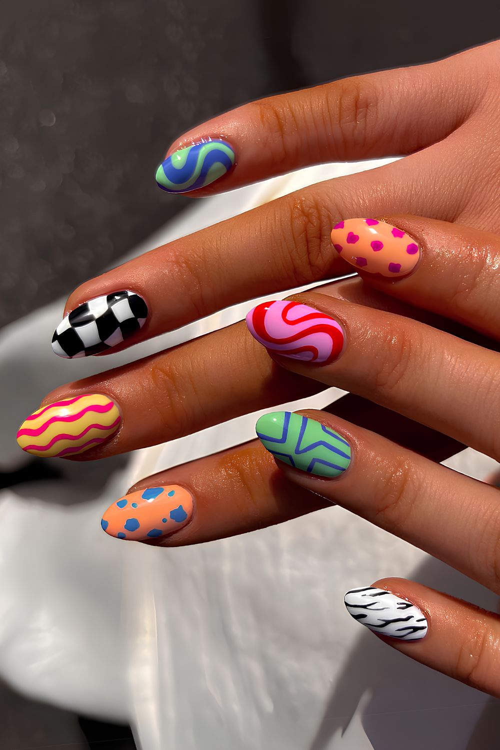 Colorful mistmatched nails with different patterns