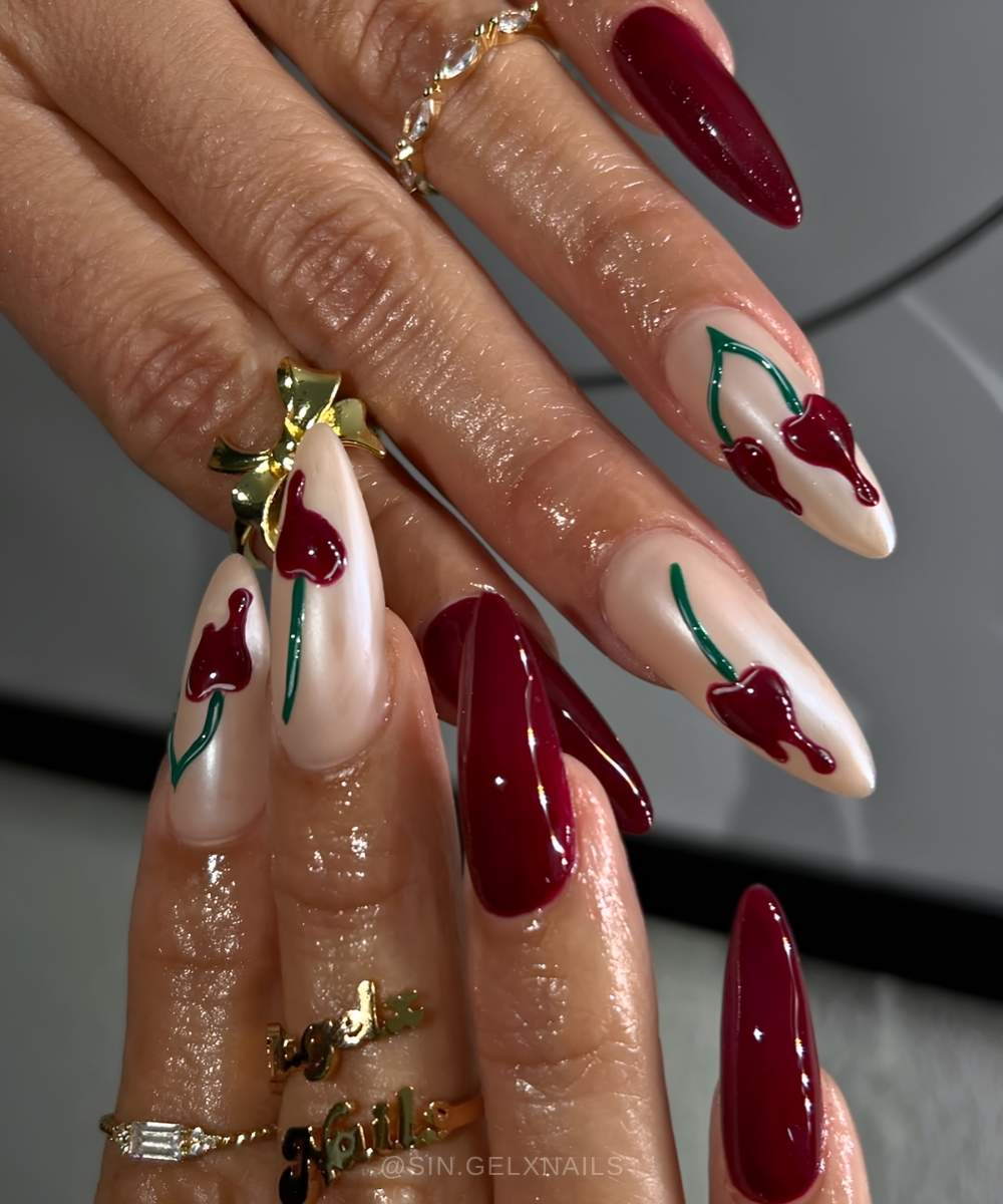 Dark red mani with melted cherry art