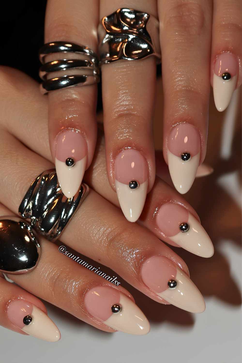 Deep vanilla French nails with silver studs