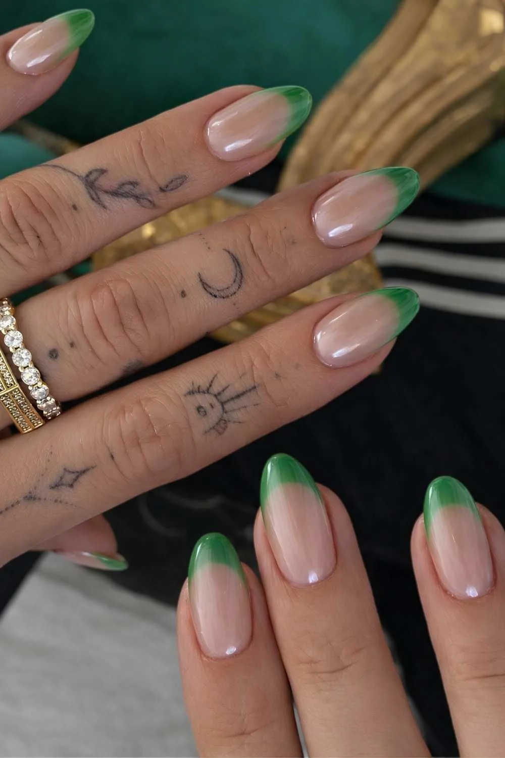Glazed green French tip manicure