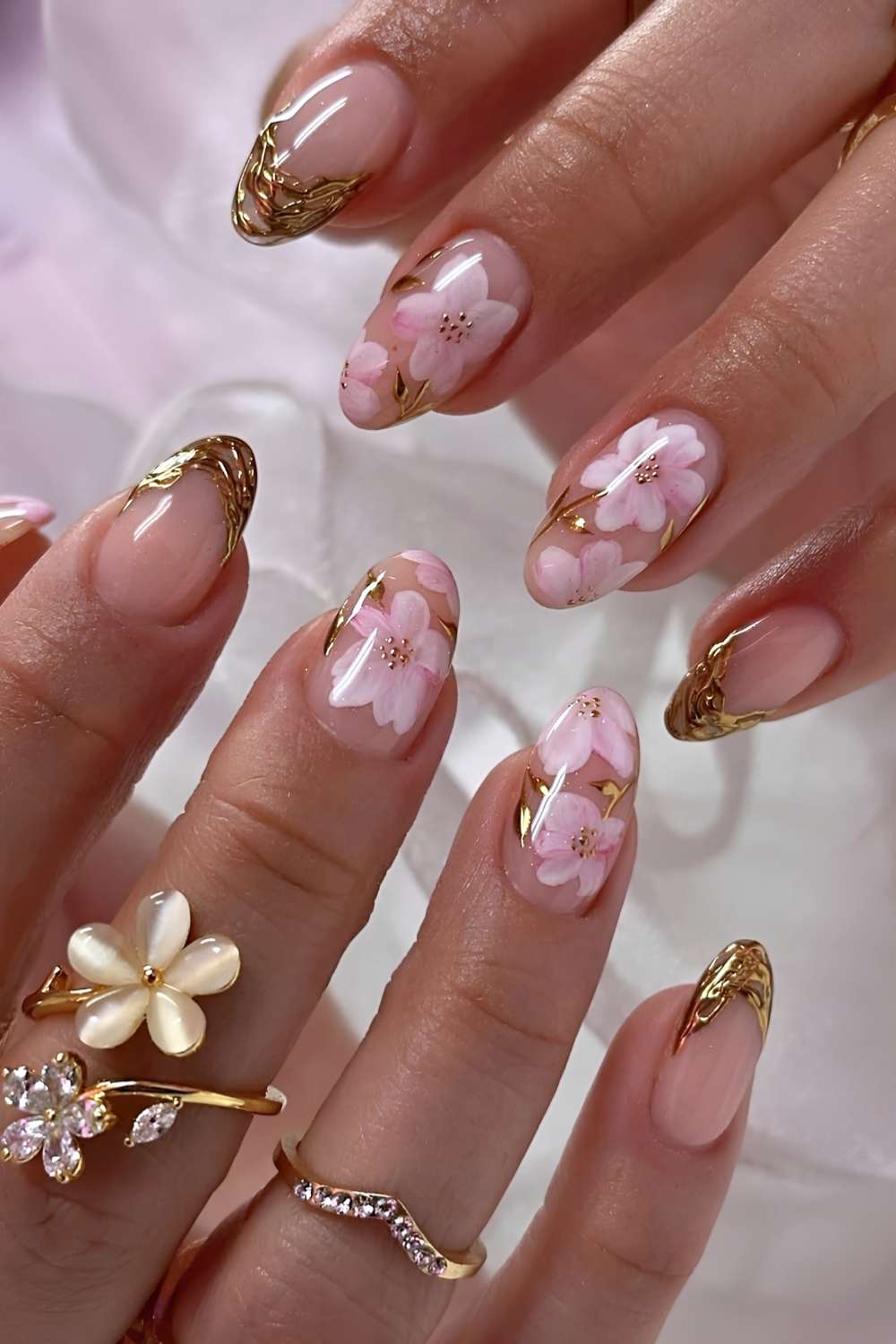 Gold French mani with sakura art