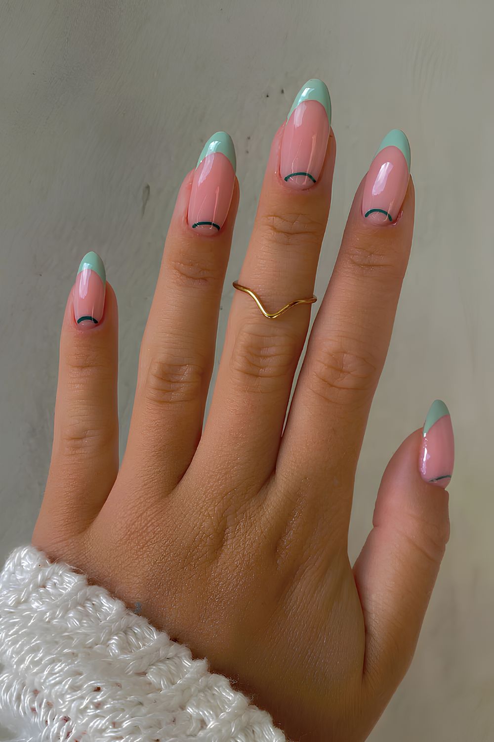 Green French nails with half-moon outlines