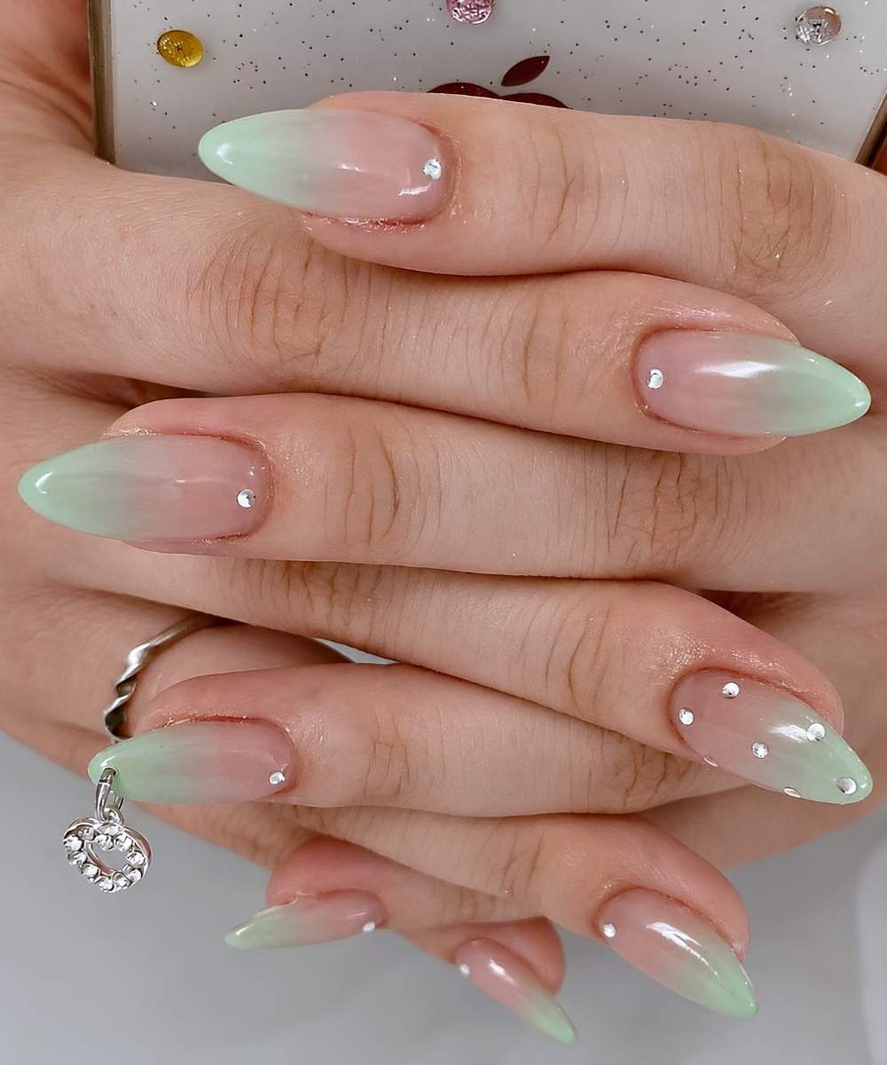 Green ombre nails with rhinestones