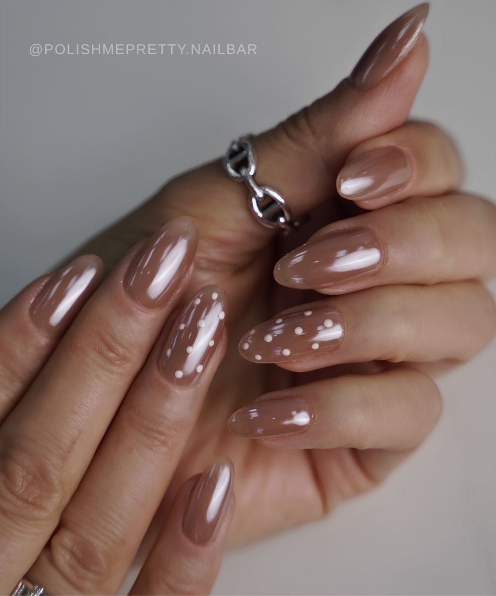 Light brown chrome nails with polka dots