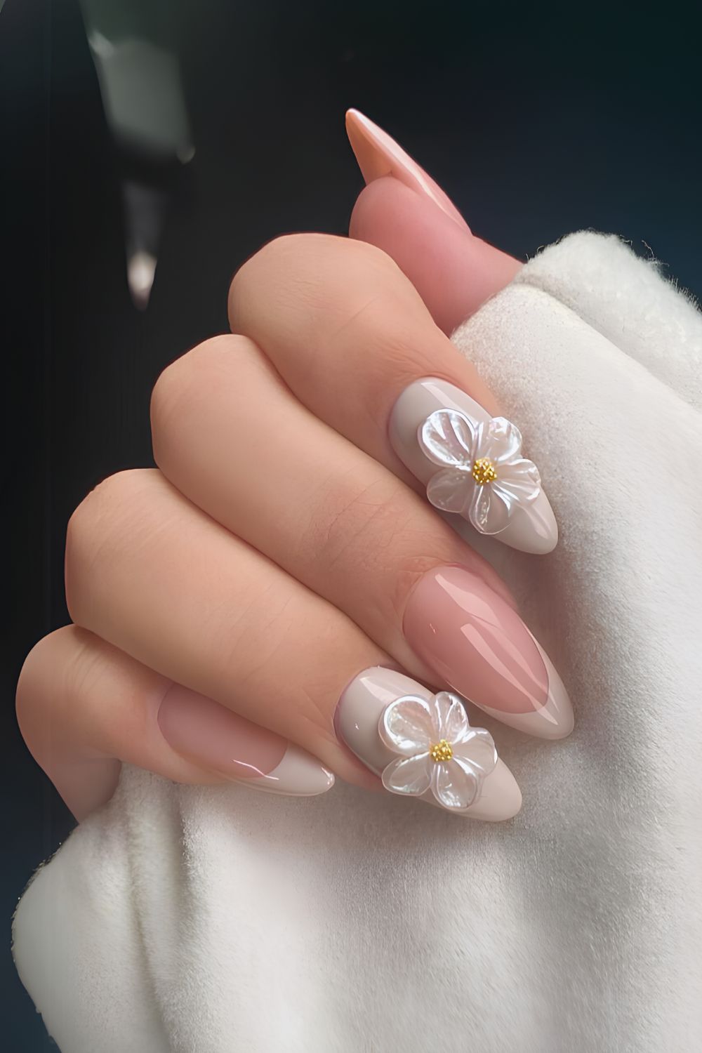 Light gray mani with sculpted flowers